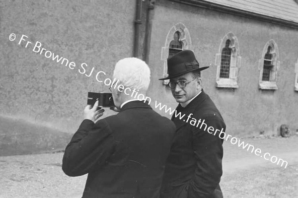 FR.GARAHY WITH CAMERA